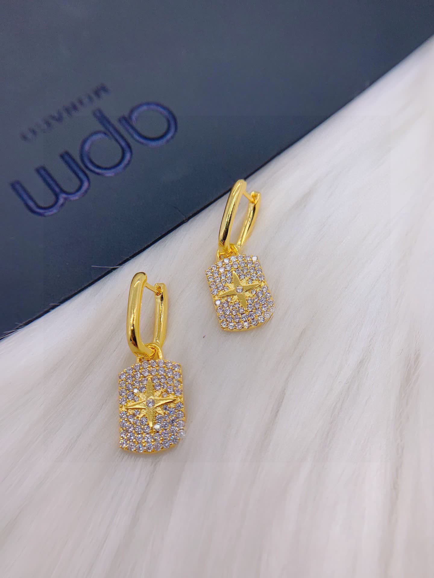 APM Monaco Elegant Gold and Diamond Star Earrings